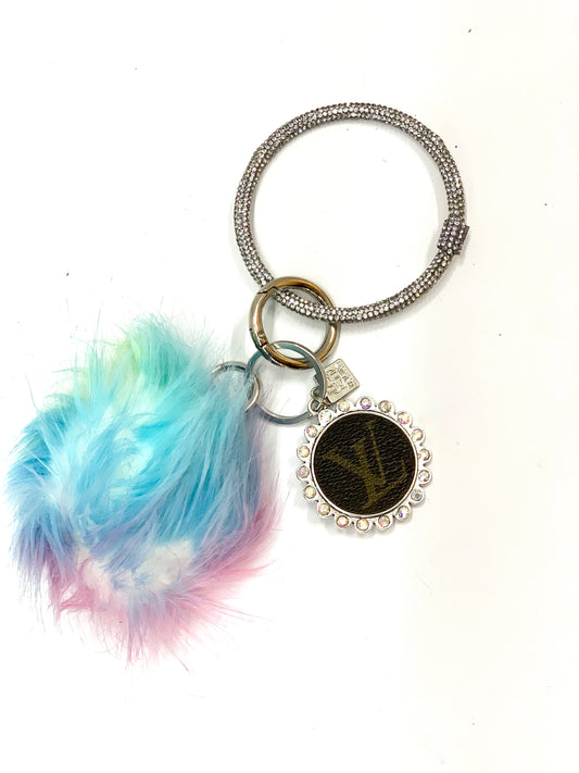 Ring Keychain in black & white cheetah with rainbow puff ball - Patches Of Upcycling